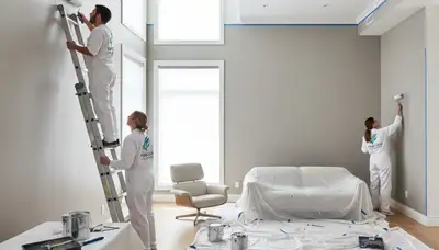 Professional interior house painters in Brandon FL applying fresh wall paint for a modern home finish